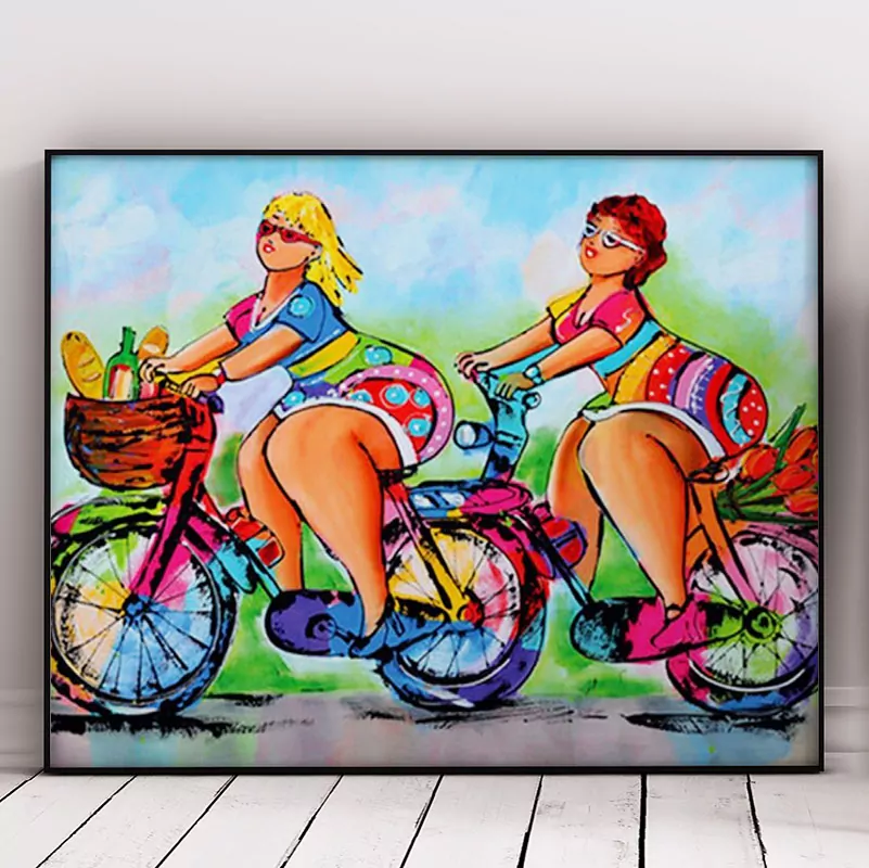 Beautiful Women Riding a Cycle